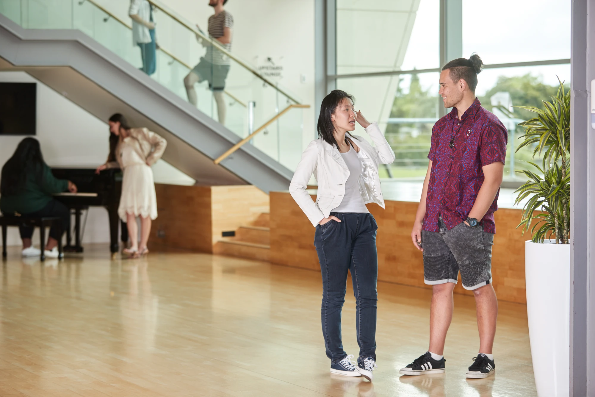 students-standing-ion-gapa-building