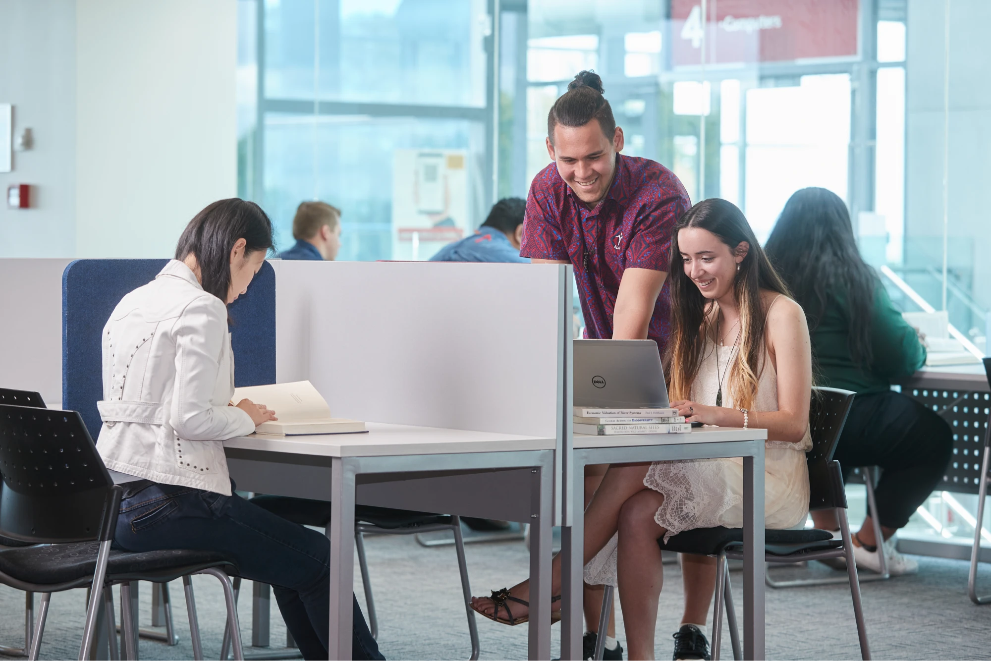 students-studying-together-in-library