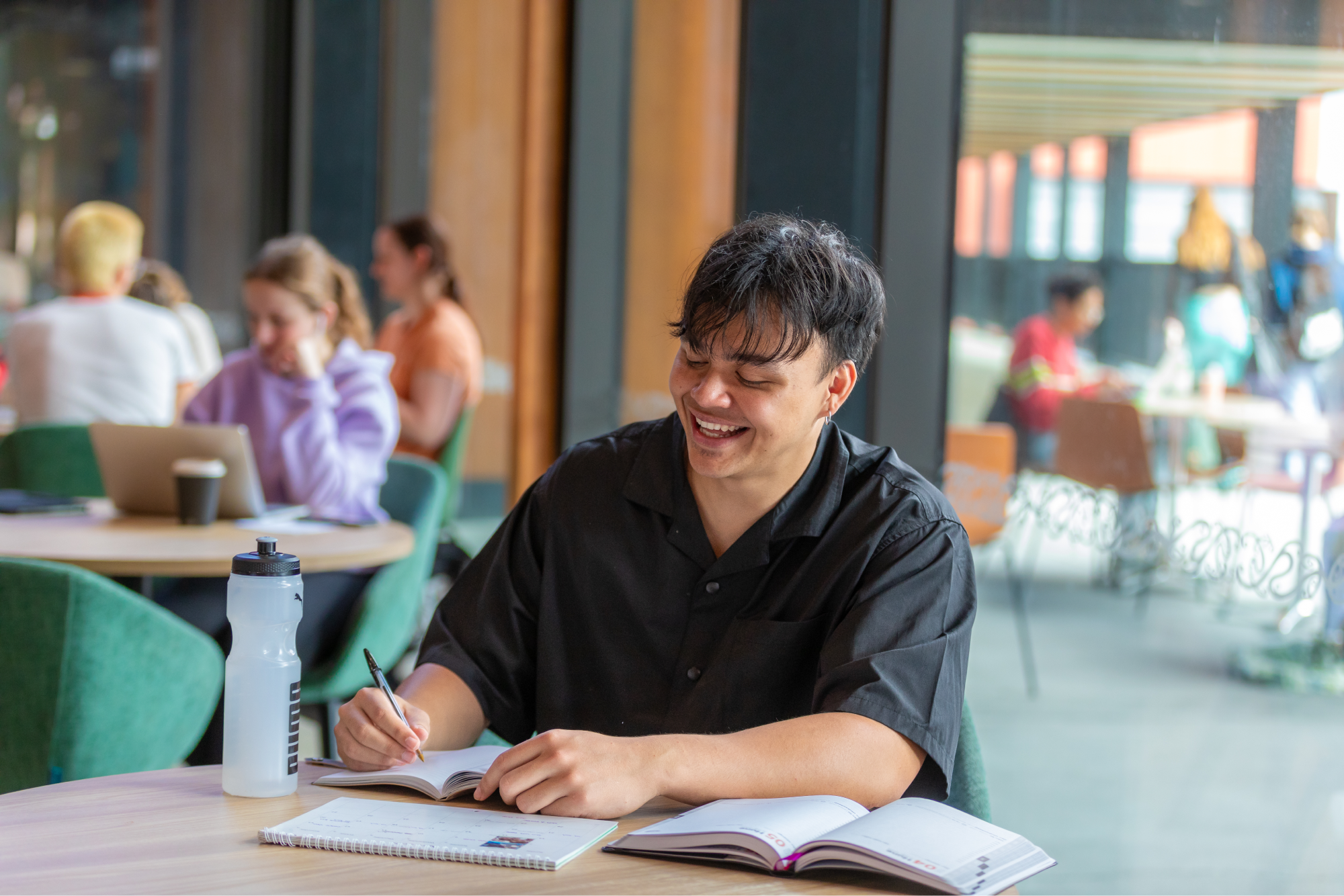 student-studying-at-table-in-pa